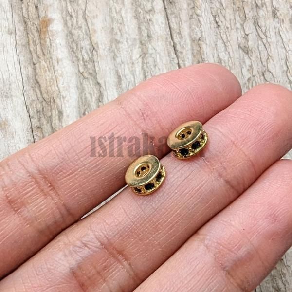 Rondelka korlka 7x3mm zlat s iernymi zirknmi